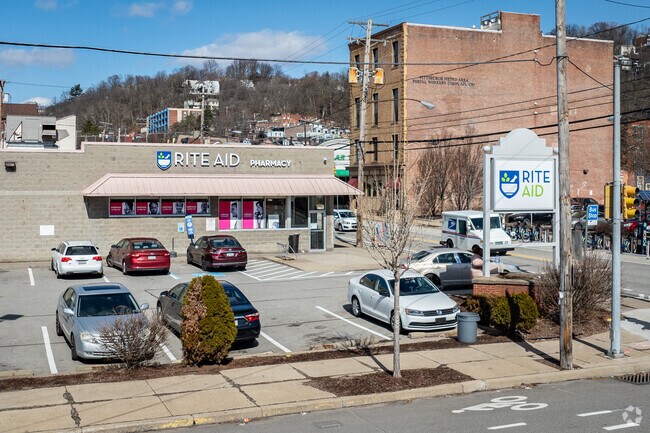 Residents shop at Rite Aid on the edge of the neighborhood in California-Kirkbride.