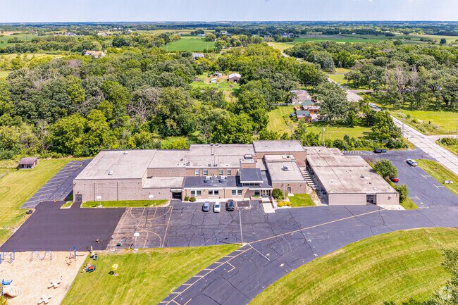 The North Cape Elementary School campus is surrounded by green space.