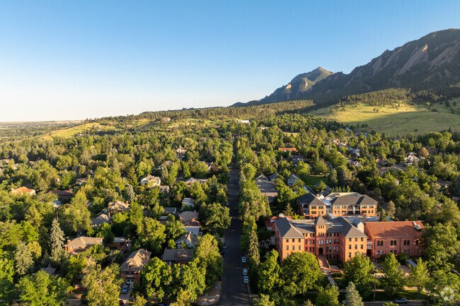 Theres an incredible view of the tree lined neighborhoods leading to Chautauqua Trail.