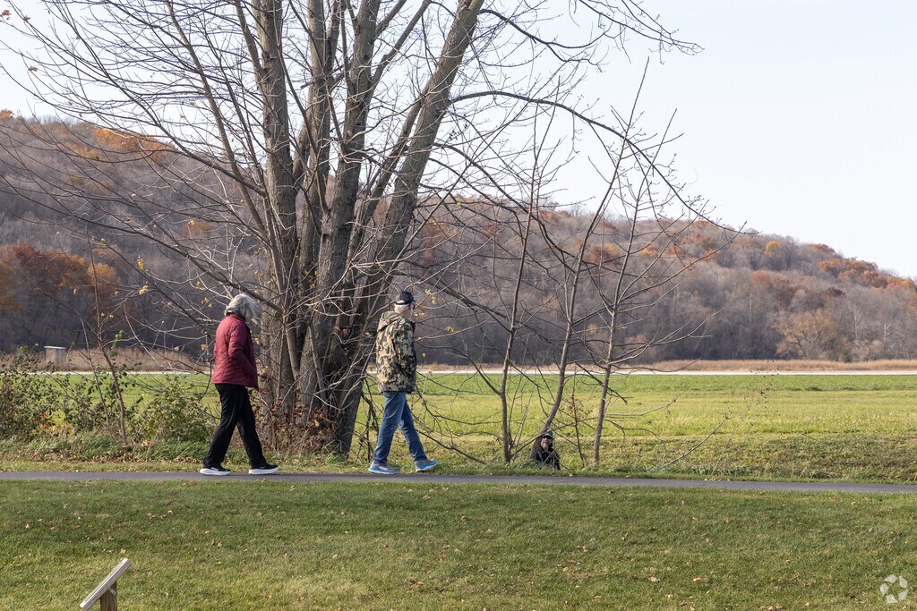 Walking paths at Mill Creek Park offer scenic views near Chatfield’s center.