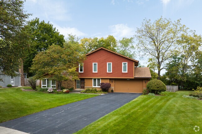 The earth tones of this Greentree Home compliments the surrounding landscape.