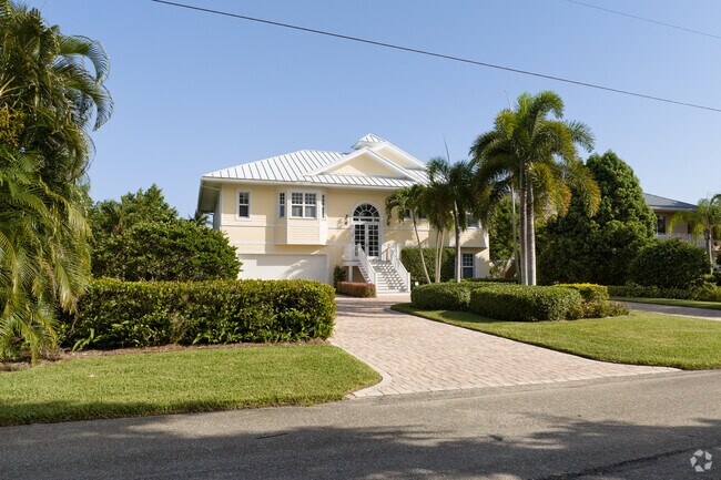 Split-level homes feature lush landscaping in Port Salerno.