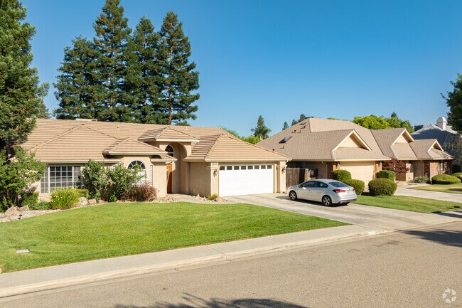 Spanish inspired ranch style homes in Mooney sit on wide neighborhood streets.