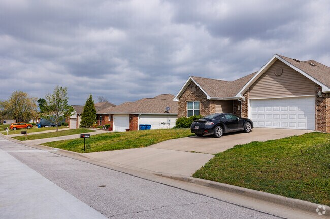 New traditional homes line a residential street in Campbell Park South.