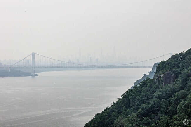 The New York skyline and George Washington Bridge seen from Alpine, NJ.