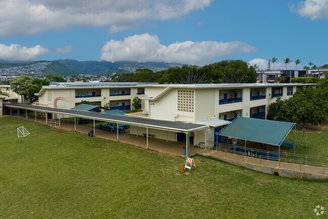 Students go to class under covered walkways at Waikiki Elementary in Honolulu.