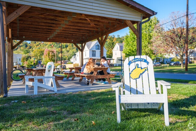 Lounge in an Adirondack chair or sit at the picnic tables at Edgewood Park in Woodsdale.