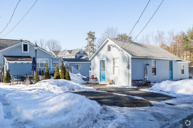 Charming cottages on Arlington Pond offer serene waterfront living with great views and a peaceful retreat from the everyday.