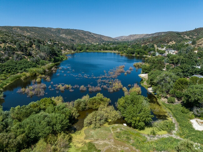 Hughes Lake bordered by homes and the Angeles National Forest in Lake Hughes.