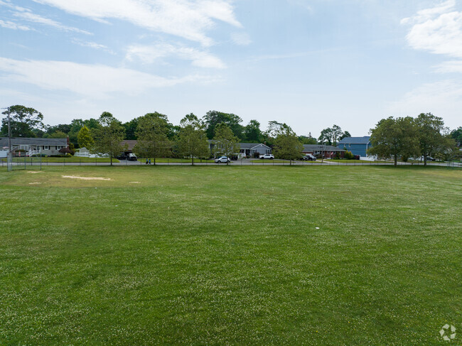 The big field right behind South Country Elementary School is where kids go for recess.