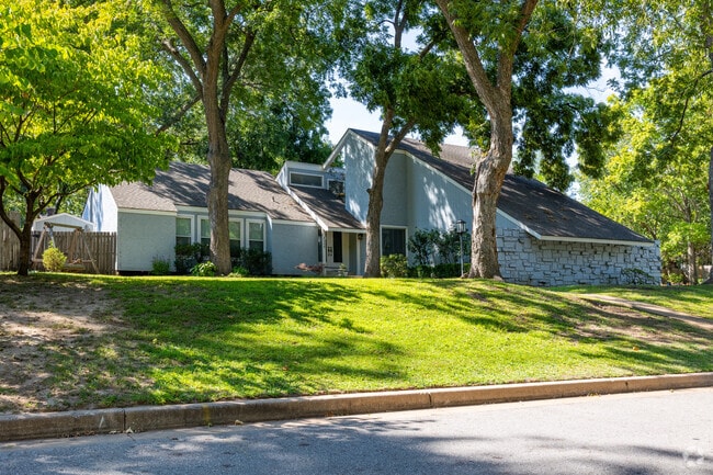 In the Brookwood neighborhood, a sleek contemporary home boasts modern design.