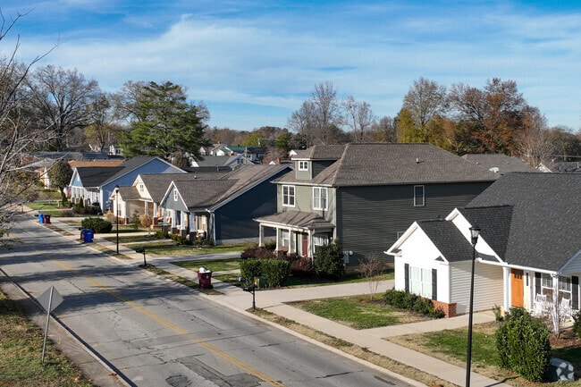Rows of residential homes and sidewalks align the streets in the Alcoa neighborhood.