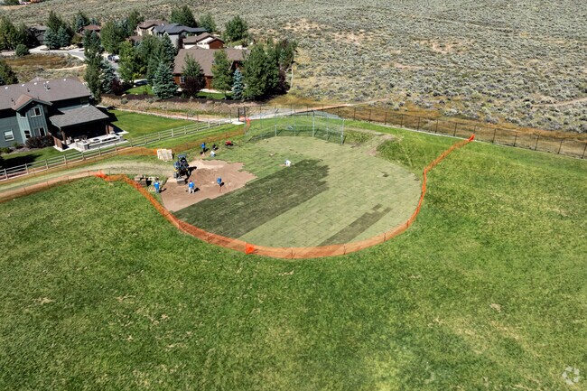 Trailside Elementary School has a multi use field with a backstop.