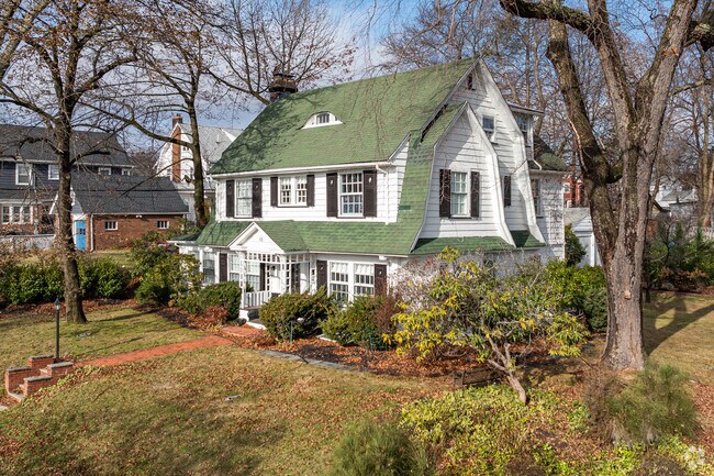 Some Dutch colonials in Montclair South End have wider yards with trees and hedges.
