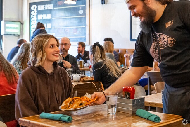 Locals of Downtown Edmond flock to Mule for the tasty cuisine and draft beer.,