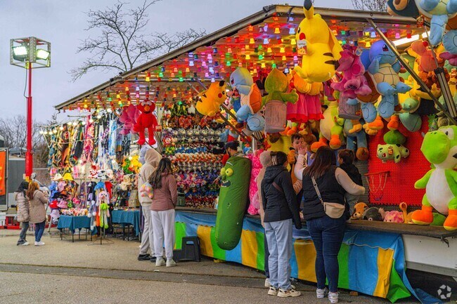 With tons of fun games and rides, families spend quality time together at the Lawrence Spring Carnival.