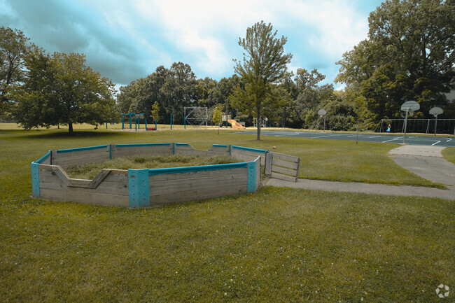 The Dicken Elementary School features a gaga pit, basketball courts, and play structures.