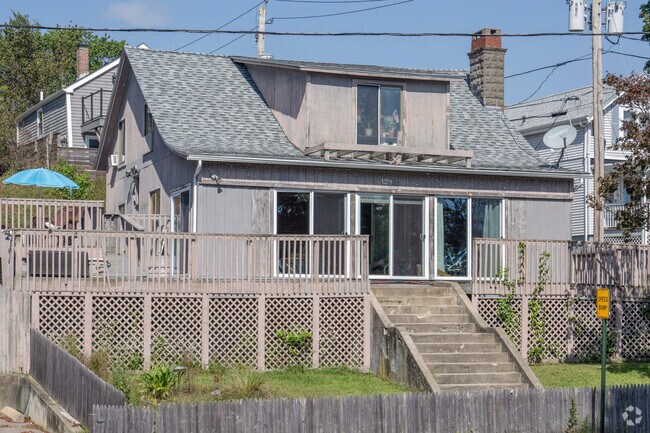 Enjoy the unique views from this beautifully modified cape home in Riverside, RI.