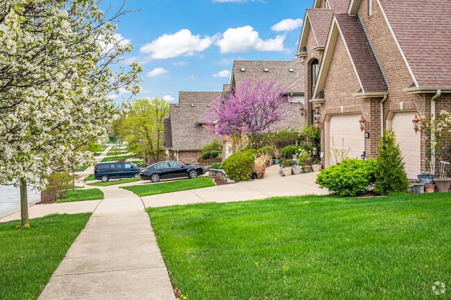 Central Orland homes often come with big green front lawns.