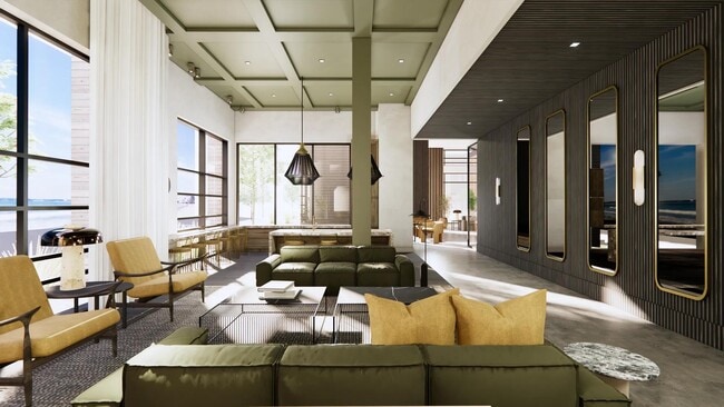 Expansive clubroom with gathering space and comfortable seating.