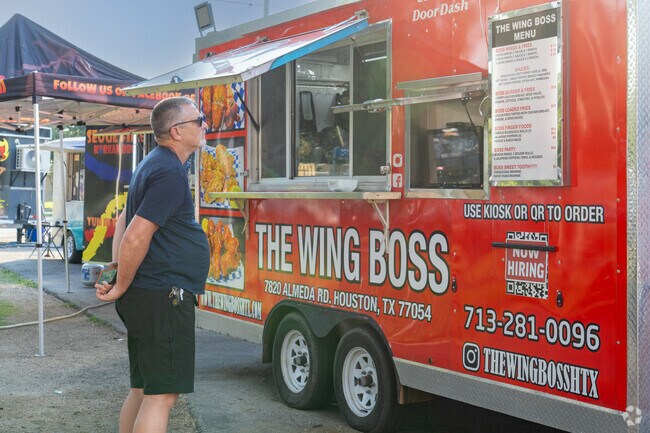 Visit Rose Hill Beer Garden near Cypress Creek Lakes for delicious food truck options.