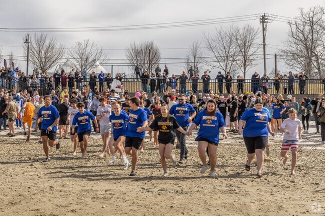 Community pride runs deep—even when the water’s ice-cold—at the Brookfield Penguin Plunge.