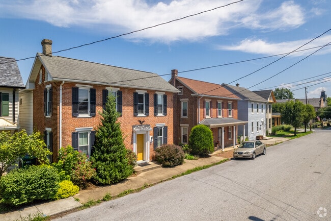 A row of Colonial style homes in Boiling Springs show the typical architecture.
