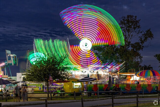 The fair at Lawson Creek Park illuminates the night sky and is visible from Brice’s Creek.