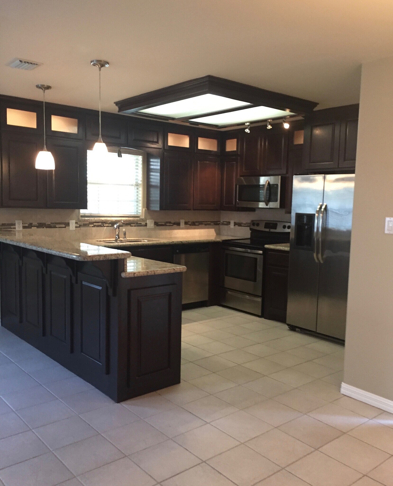 Granite throughout , SS Appliances!