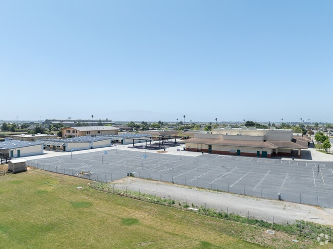 Extracurricular activities enhance student life at John Gutierrez Middle School.