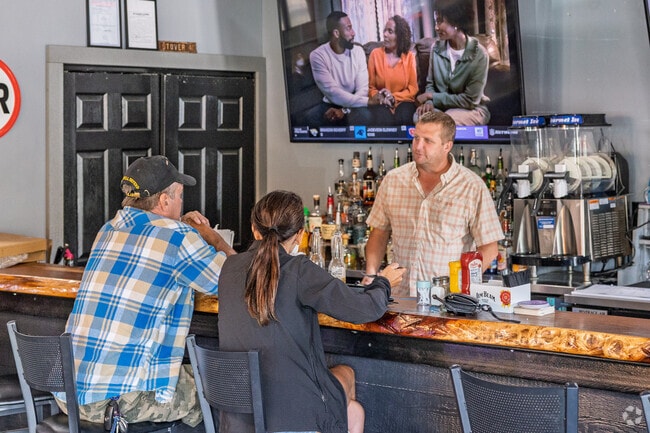 Stover residents enjoy a break and conversation at Patio 52.