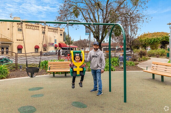 Garin Ranch park has a playground with a swing set.