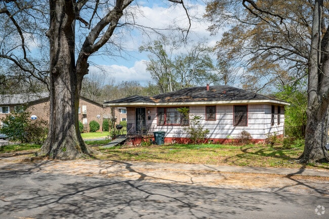 Mature trees shade many homes in Tarpley City’s residential streets.