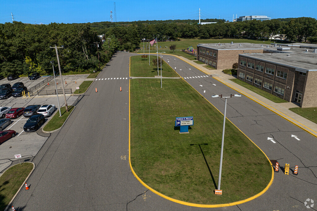 Buses can navigate freely with this oval driveway.