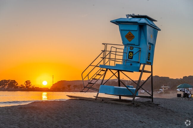 Enjoy a sunset with a lifeguard tower at Doheny State Beach near Capistrano Beach.
