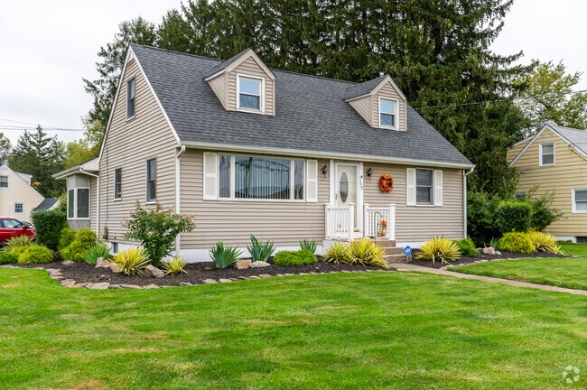 A cozy cottage in Ewingville offers charm and affordability for first-time homebuyers.