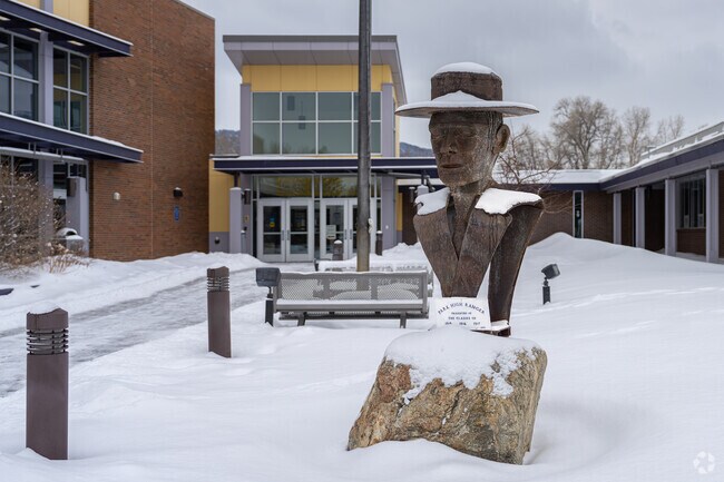 A ranger sculpture outside the entrance to Park High School greets Livingston students.