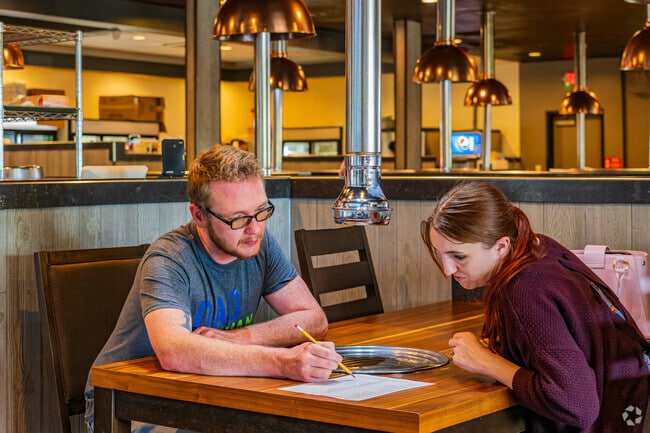 Locals can choose from various meats in GangNam near Highland-Santa Fe.