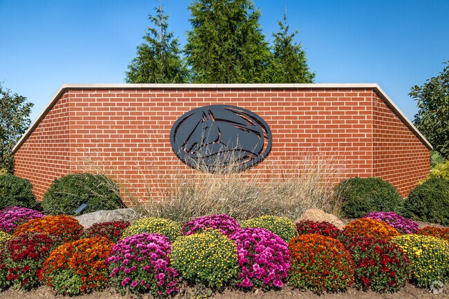 The entry for Old Hawthorne greets you with a large red brick sign.