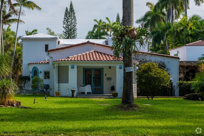 A Spanish-influenced single-family home is located in Upper East Side South.