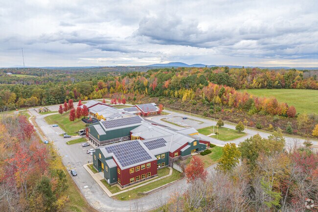 There are trees surrounding Glenwood Elementary in North Rutland.