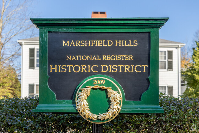 An brilliant green sign greets you as you enter Marshfield Hills.