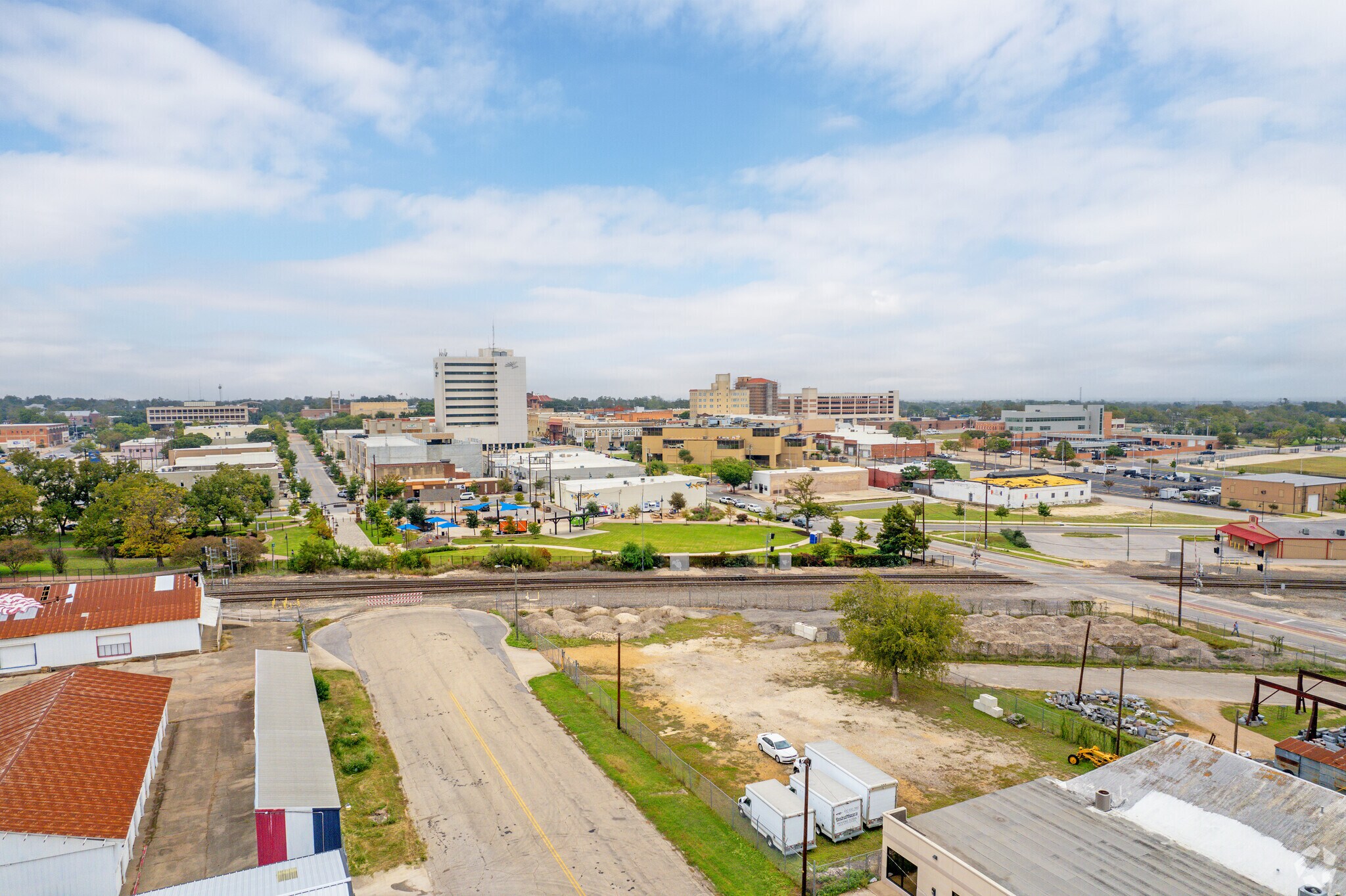 Homes skirt around Temple's small Downtown District with the railyards enclosing the south side.