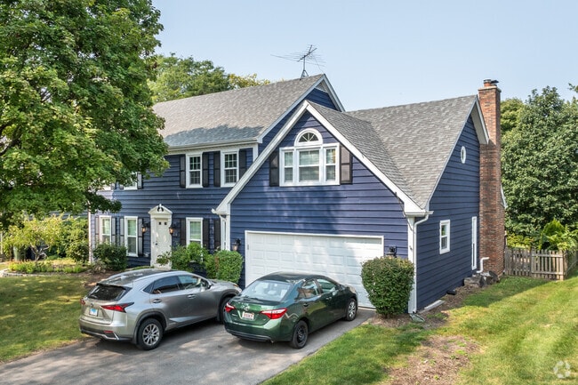 There are beautiful colonial style homes of varying materials in the Farmington neighborhood.