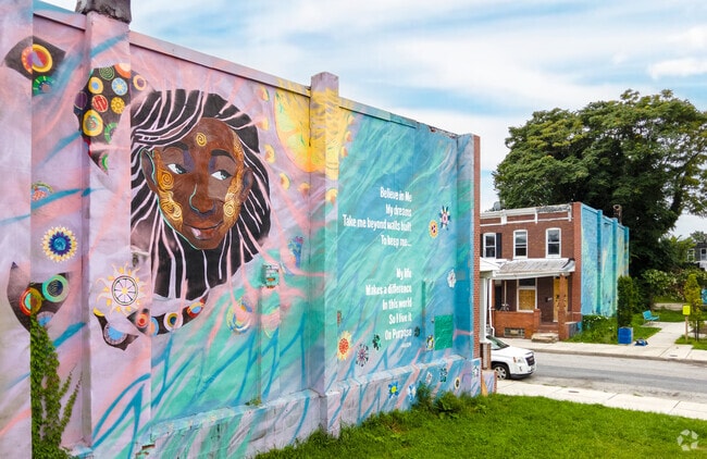 Local artist Whitney Frazier created a vibrant mural in South Clifton Park.