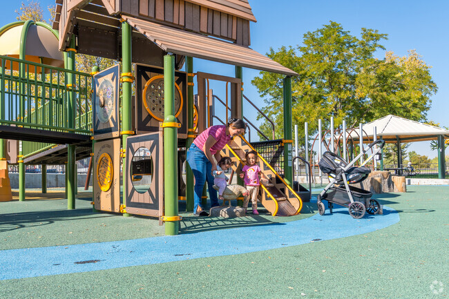 Families rush to the playground at Greeley's Island Grove Regional Park on the weekends.
