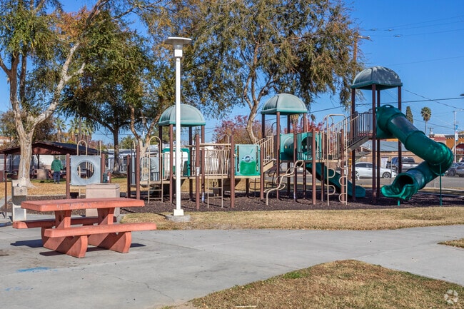 Kids enjoy the large playground at Kerckhoff Park in Kerman.