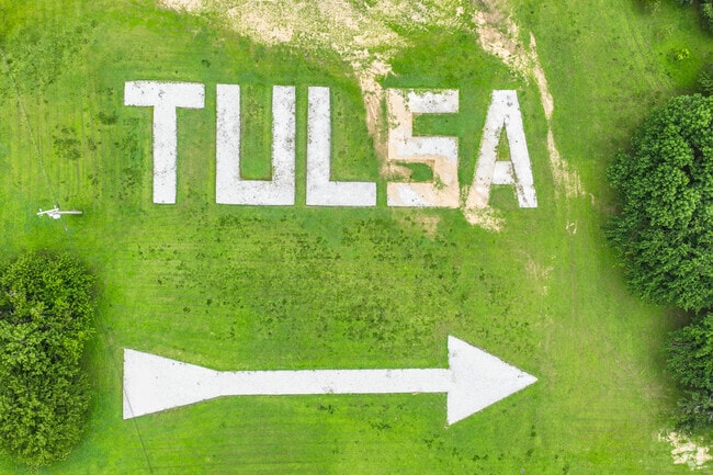 The Aviator's Arrow leads pilots to Tulsa International Airport near Acre Gardens.