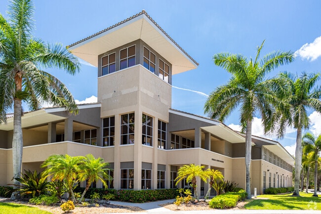 Naples Christian Academy features a large corner tower at the main entracne.