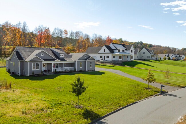 New developments like this one on Strongfield Drive are featuring homes with 2-3 garages.